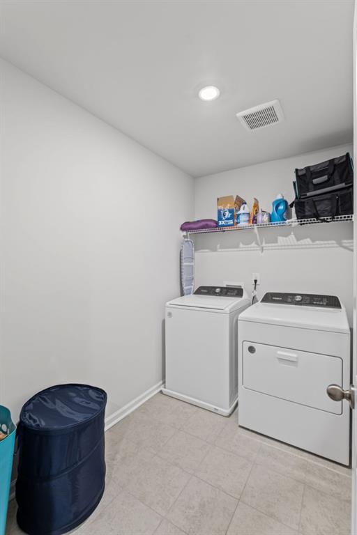 346 Wells Circle Canton, GA 30114 - Photo 30 of 35 a utility room with dryer and washer