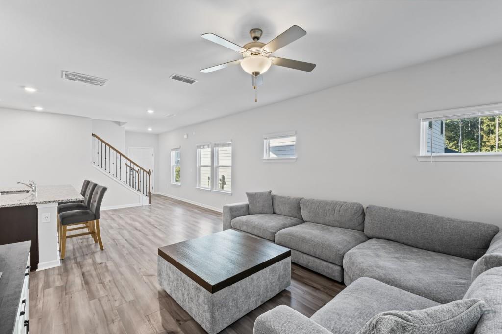 346 Wells Circle Canton, GA 30114 - Photo 10 of 35 a living room with furniture and wooden floor
