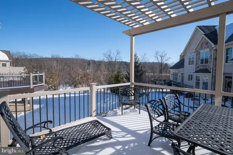 a bed room with furniture and a window