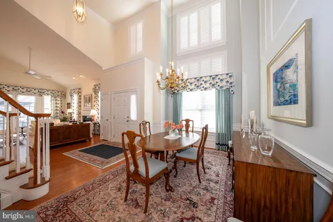 a bathroom with 2 sink and a mirror