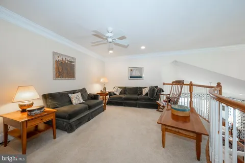 a view of a backyard with swimming pool