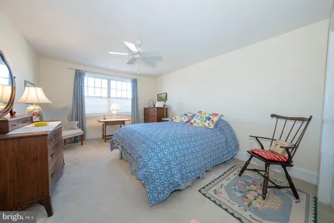 a view of a dining room livingroom furniture and wooden floor