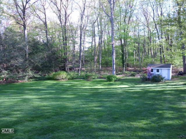 166 Hurd Road Trumbull, CT 06611 - Photo 1 of 1 a garden view with a seating space