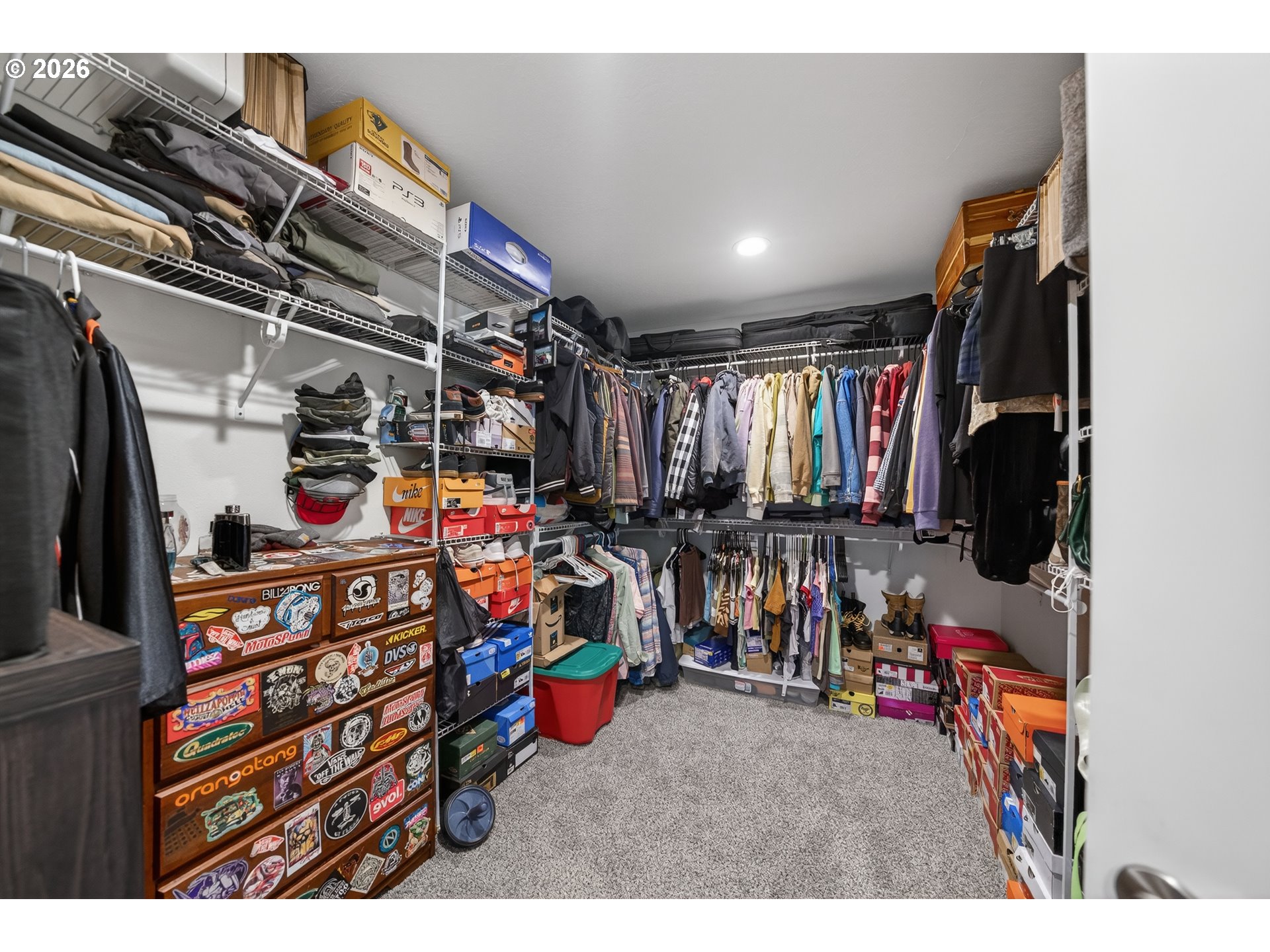 601 Southeast Rose Ridge Drive Winston, OR 97496 - Photo 17 of 40 a view of walk in closet with clothes and shoes