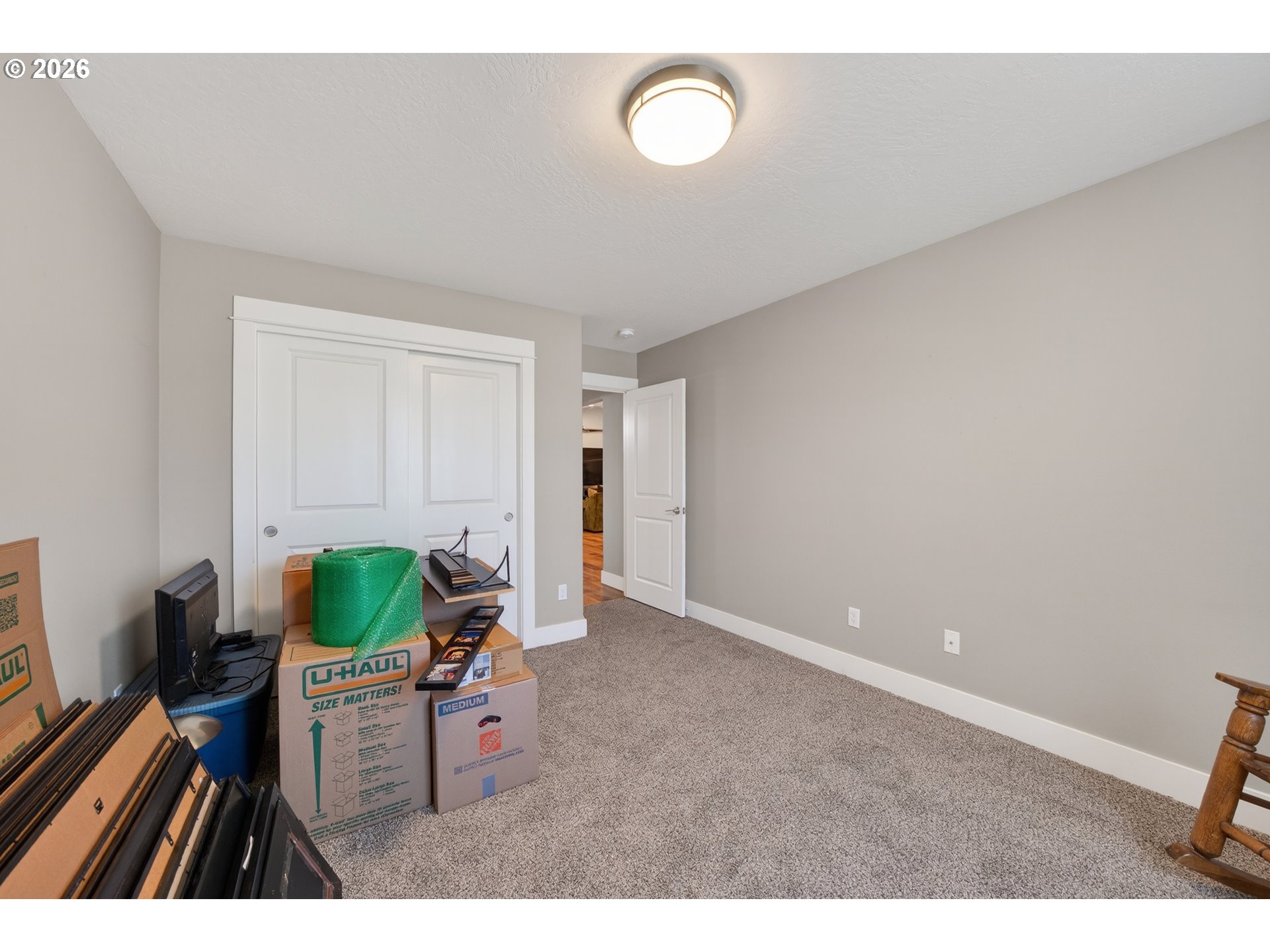 601 Southeast Rose Ridge Drive Winston, OR 97496 - Photo 19 of 40 a workspace with furniture and a potted plant