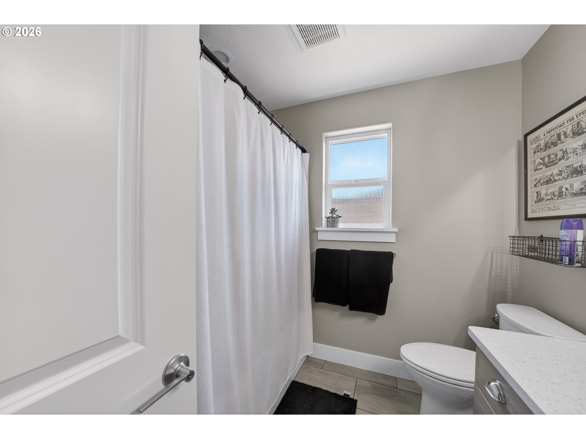 601 Southeast Rose Ridge Drive Winston, OR 97496 - Photo 23 of 40 a bathroom with a toilet a sink and garden