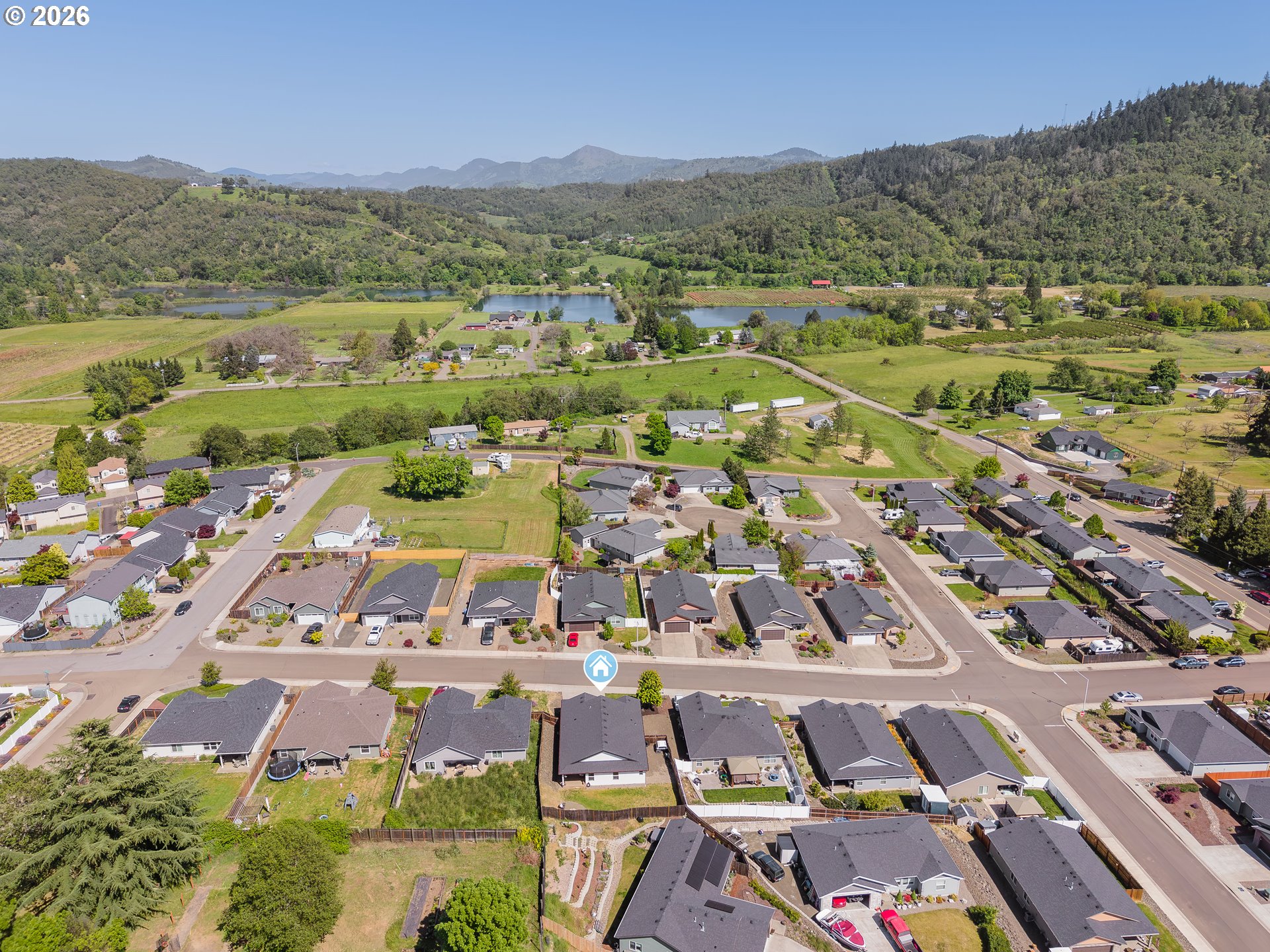 601 Southeast Rose Ridge Drive Winston, OR 97496 - Photo 39 of 40 an aerial view of residential houses with outdoor space