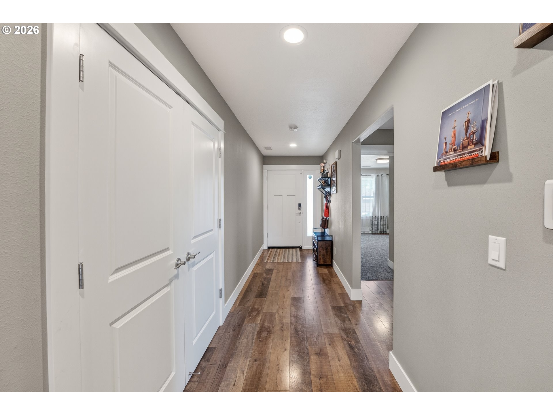 601 Southeast Rose Ridge Drive Winston, OR 97496 - Photo 4 of 40 a view of hallway with wooden floor