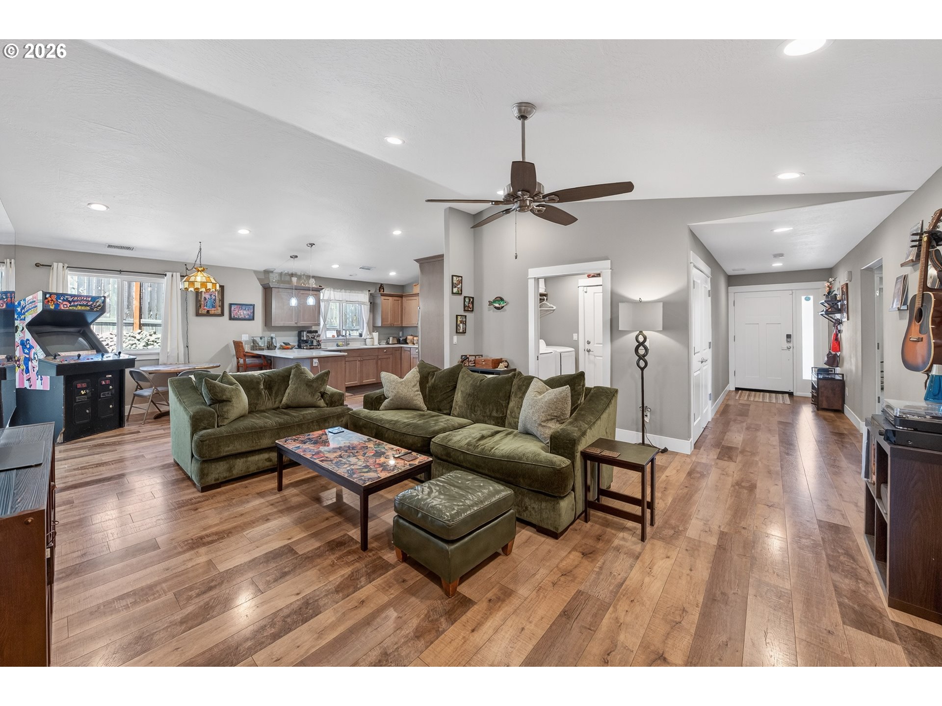 601 Southeast Rose Ridge Drive Winston, OR 97496 - Photo 5 of 40 a living room with furniture and a wooden floor