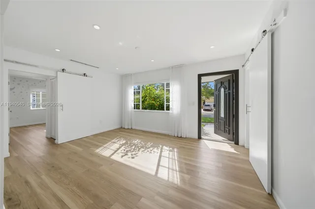 a view of an empty room and window
