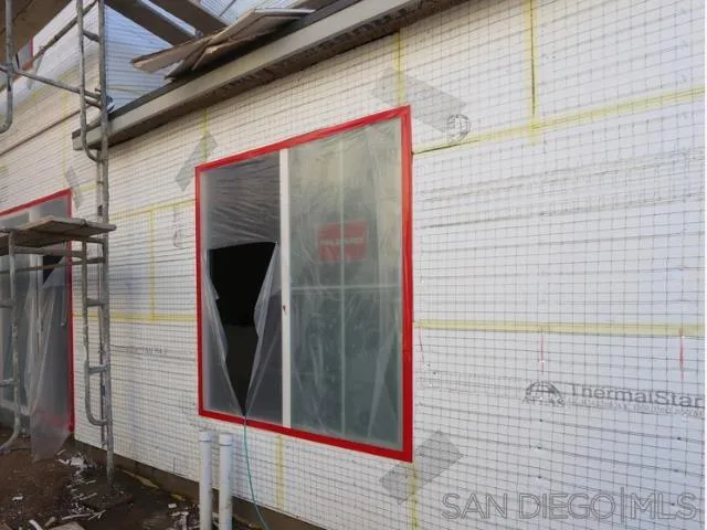 204 Blended Place Fallbrook, CA 92028 - Photo 3 of 18 a view of a door and wooden floor
