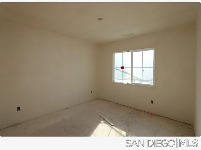 204 Blended Place Fallbrook, CA 92028 - Photo 8 of 18 a view of an empty room with a window