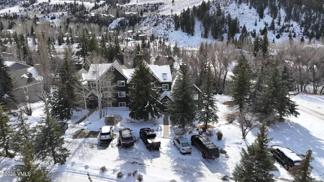 a view of a backyard with sitting area