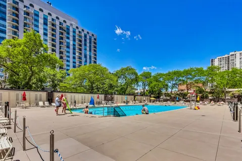 a view of street with tall buildings