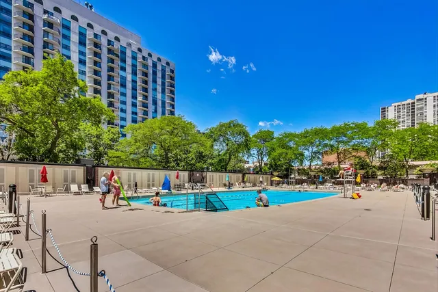 a view of street with tall buildings