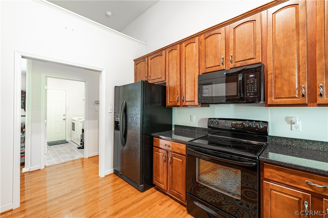 125 Jesse's Way Farmville, VA 23901 - Photo 11 of 42 a kitchen with stainless steel appliances granite countertop a refrigerator stove and microwave