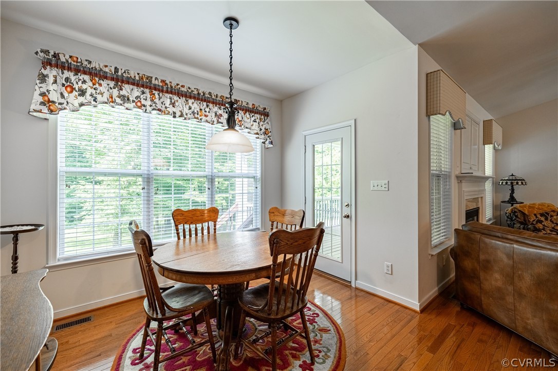 125 Jesse's Way Farmville, VA 23901 - Photo 15 of 42 a view of a dining room with furniture window and wooden floor