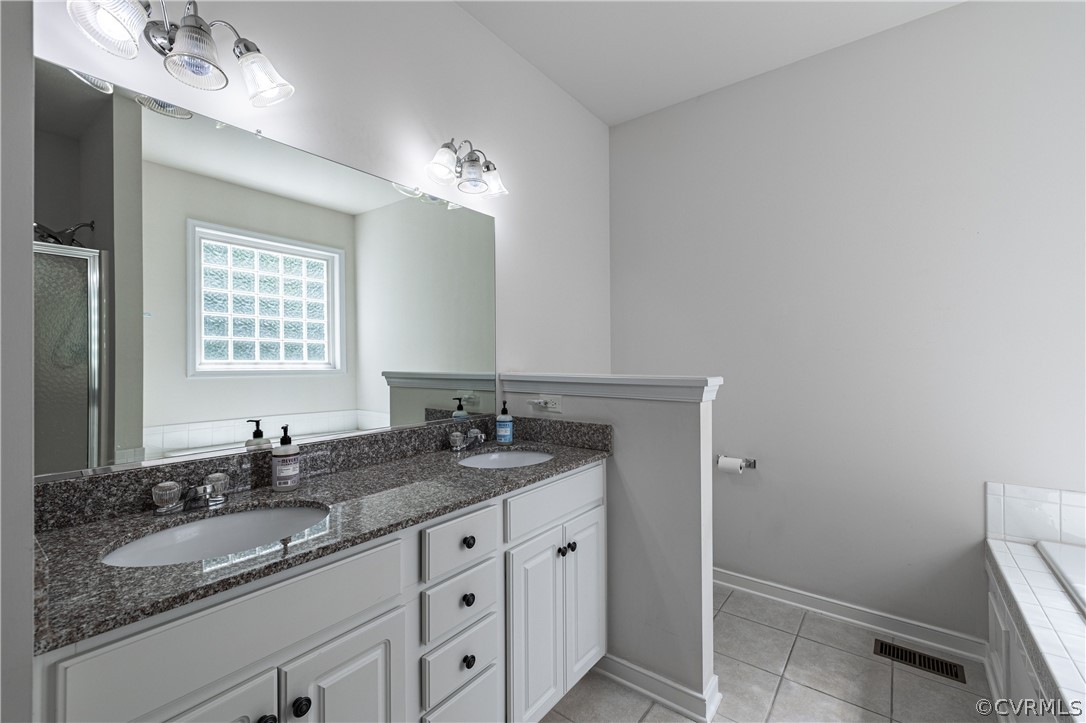 125 Jesse's Way Farmville, VA 23901 - Photo 22 of 42 a bathroom with a granite countertop double vanity sink and mirror