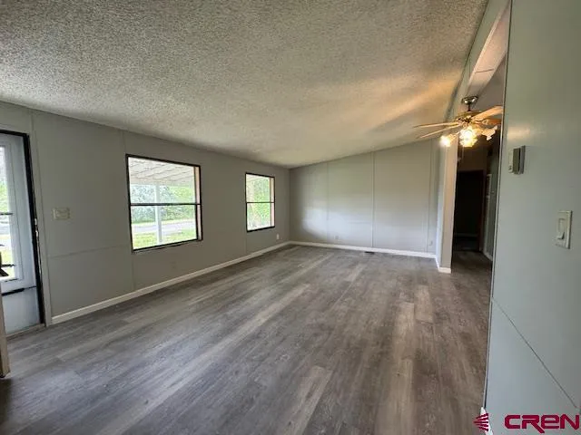 an empty room with windows