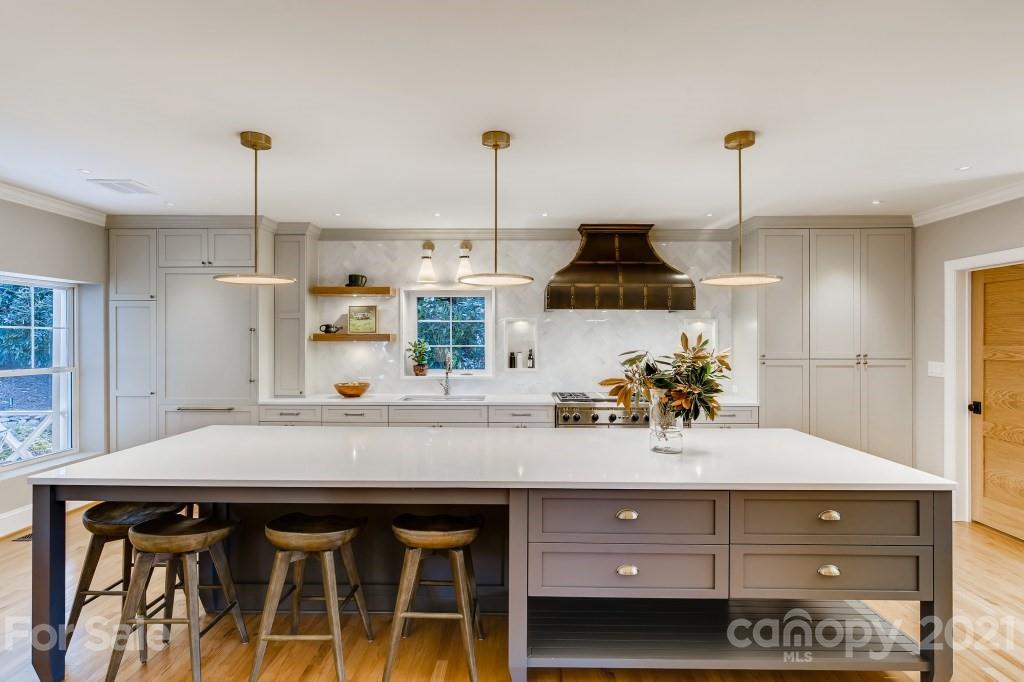 19032 Mountainview Drive Cornelius, NC 28031 - Photo 11 of 44 a kitchen with a sink and cabinets