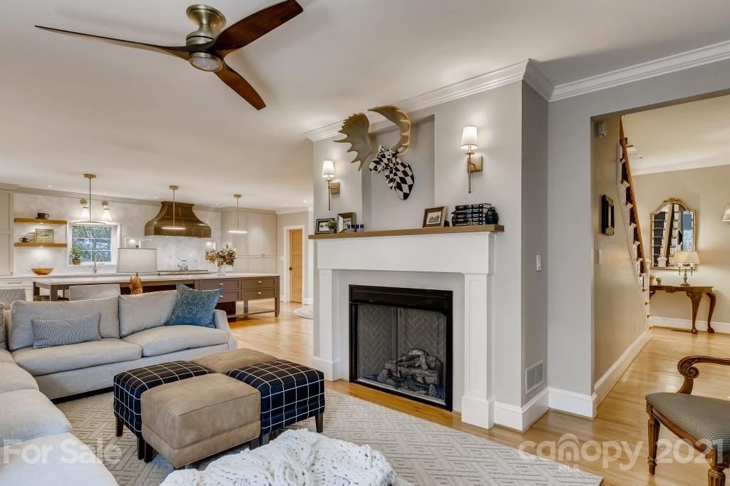 19032 Mountainview Drive Cornelius, NC 28031 - Photo 13 of 44 a living room with furniture and a fireplace