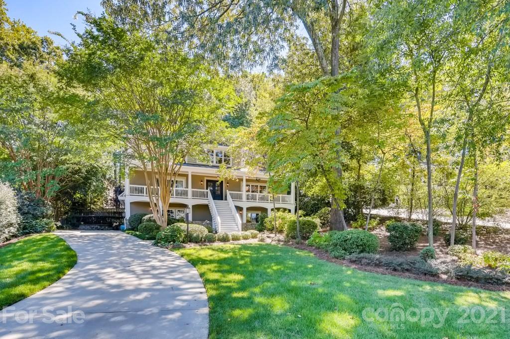 19032 Mountainview Drive Cornelius, NC 28031 - Photo 2 of 44 front view of a house with a yard