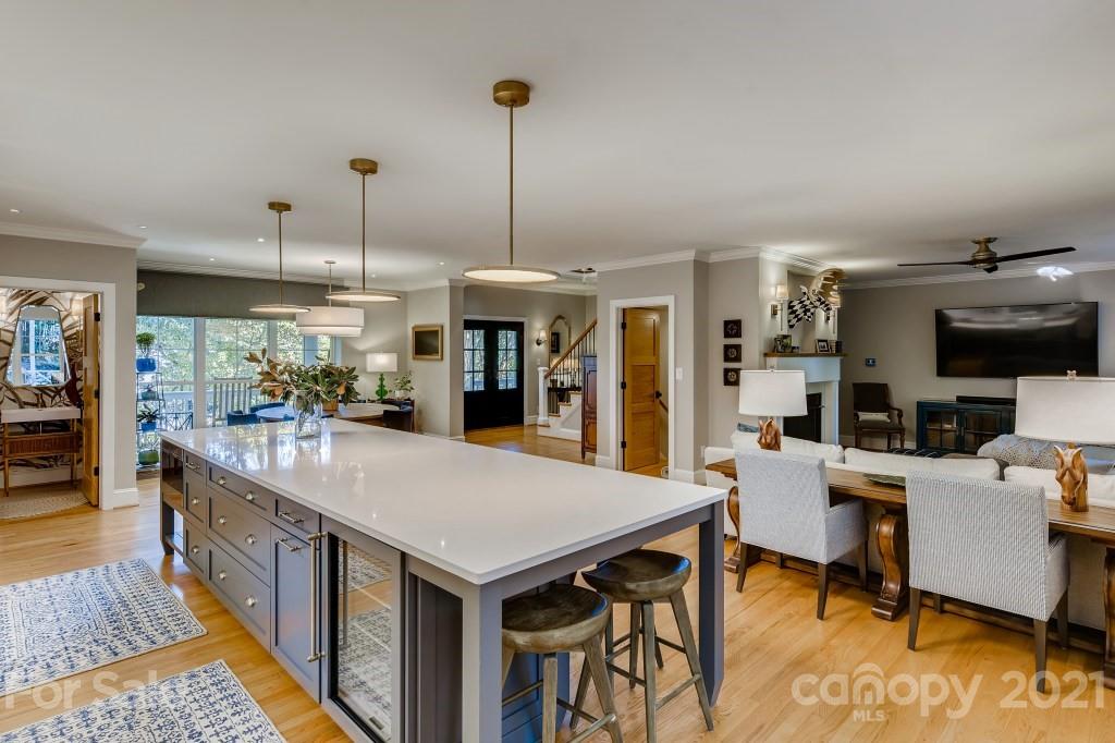 19032 Mountainview Drive Cornelius, NC 28031 - Photo 8 of 44 a large kitchen with a table and chairs