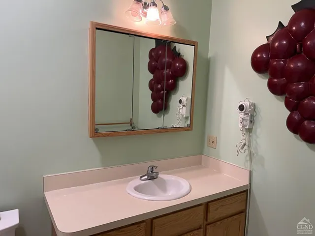 a bathroom with a toilet and shower