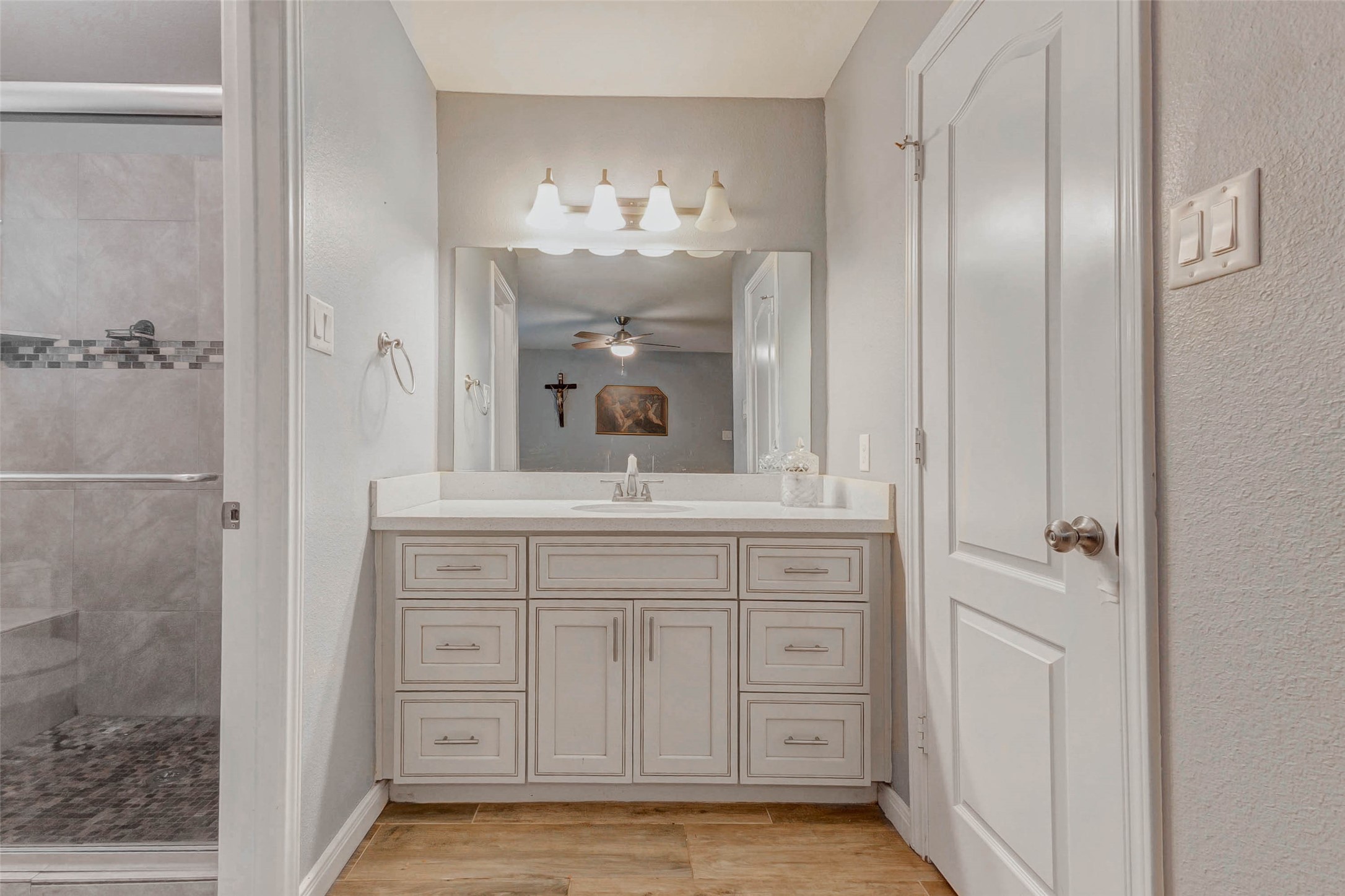 23010 Bayleaf Drive Spring, TX 77373 - Photo 18 of 21 a bathroom with a double vanity sink and a mirror
