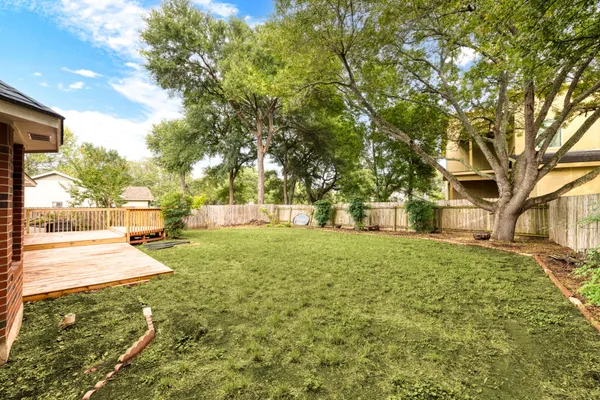 a view of yard with tree s
