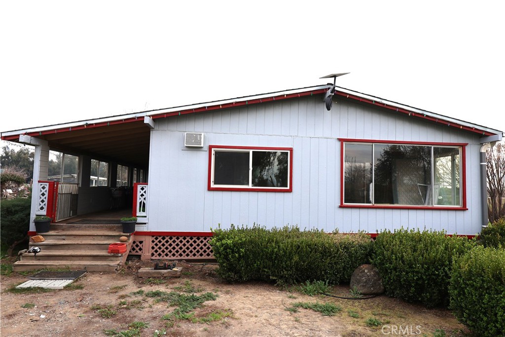 20490 Corning Road Corning, CA 96021 - Photo 18 of 51 a front view of a house with a yard