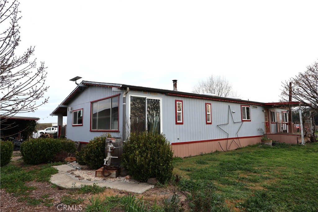 20490 Corning Road Corning, CA 96021 - Photo 20 of 51 a house view with a garden space
