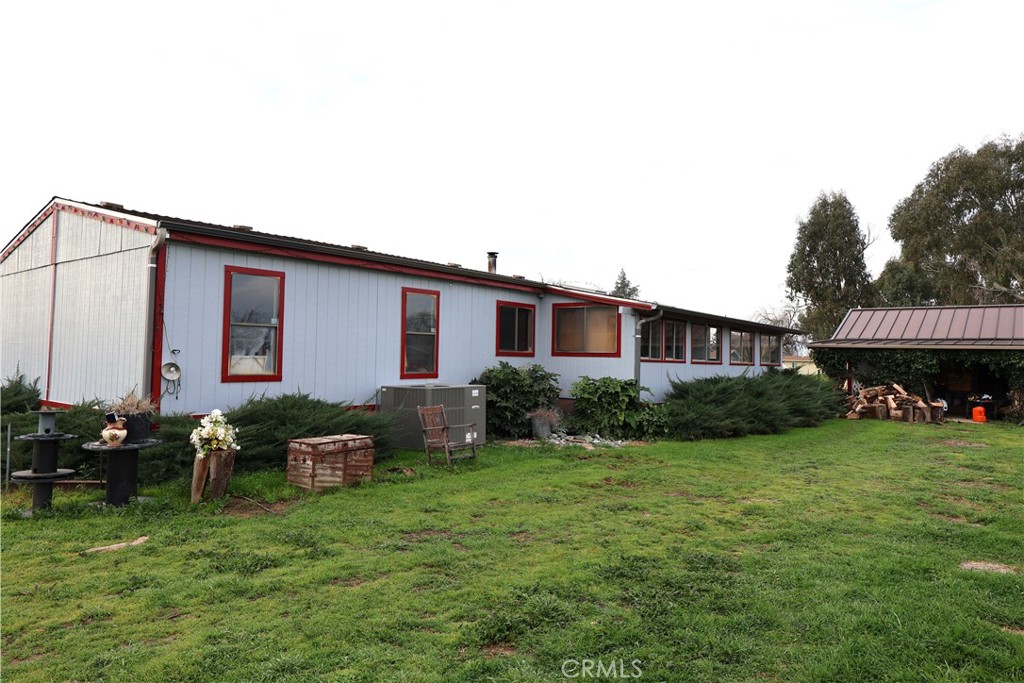 20490 Corning Road Corning, CA 96021 - Photo 2 of 51 a view of a house with backyard sitting area and garden