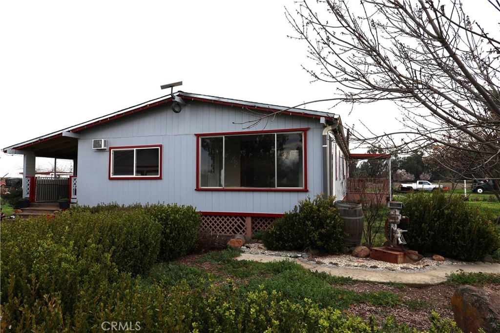 20490 Corning Road Corning, CA 96021 - Photo 21 of 51 a backyard of a house with a garden