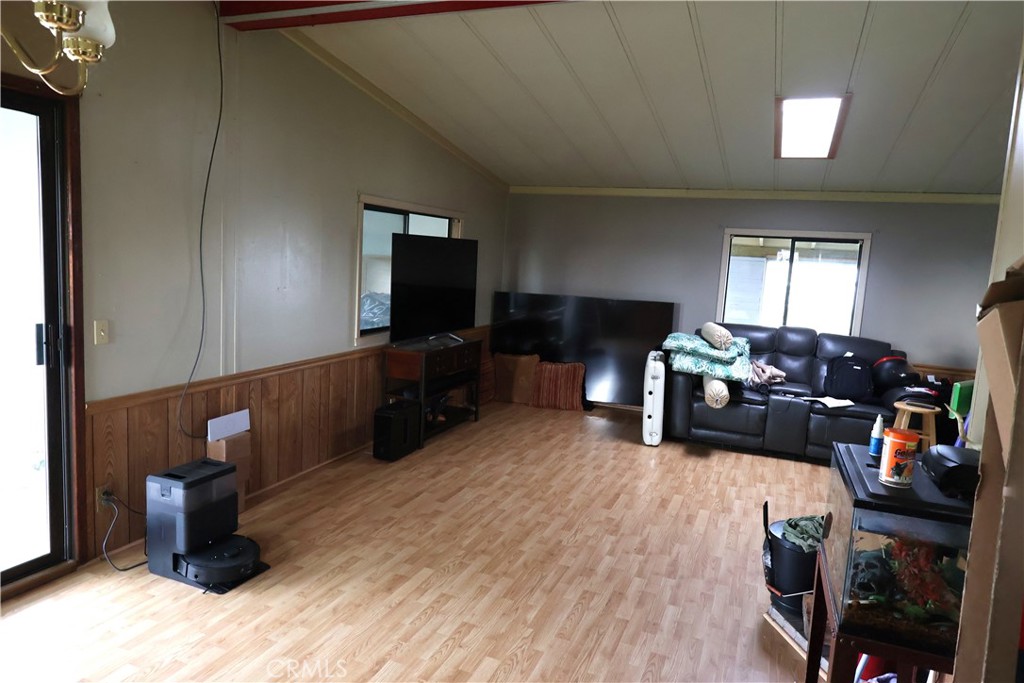 20490 Corning Road Corning, CA 96021 - Photo 23 of 51 a living room with furniture and a flat screen tv