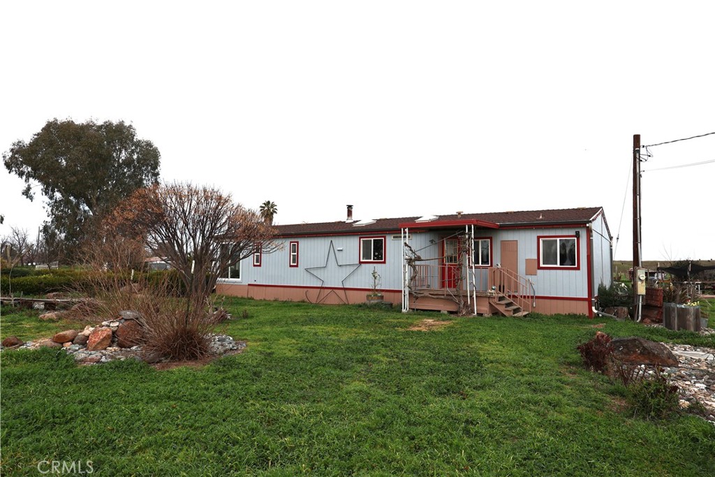 20490 Corning Road Corning, CA 96021 - Photo 3 of 51 a house view with a garden space