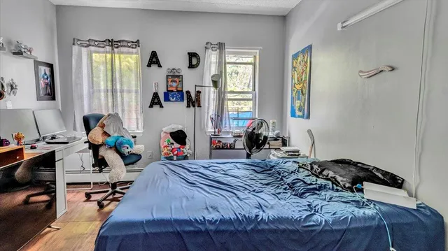 a bed room with a bed and a couch