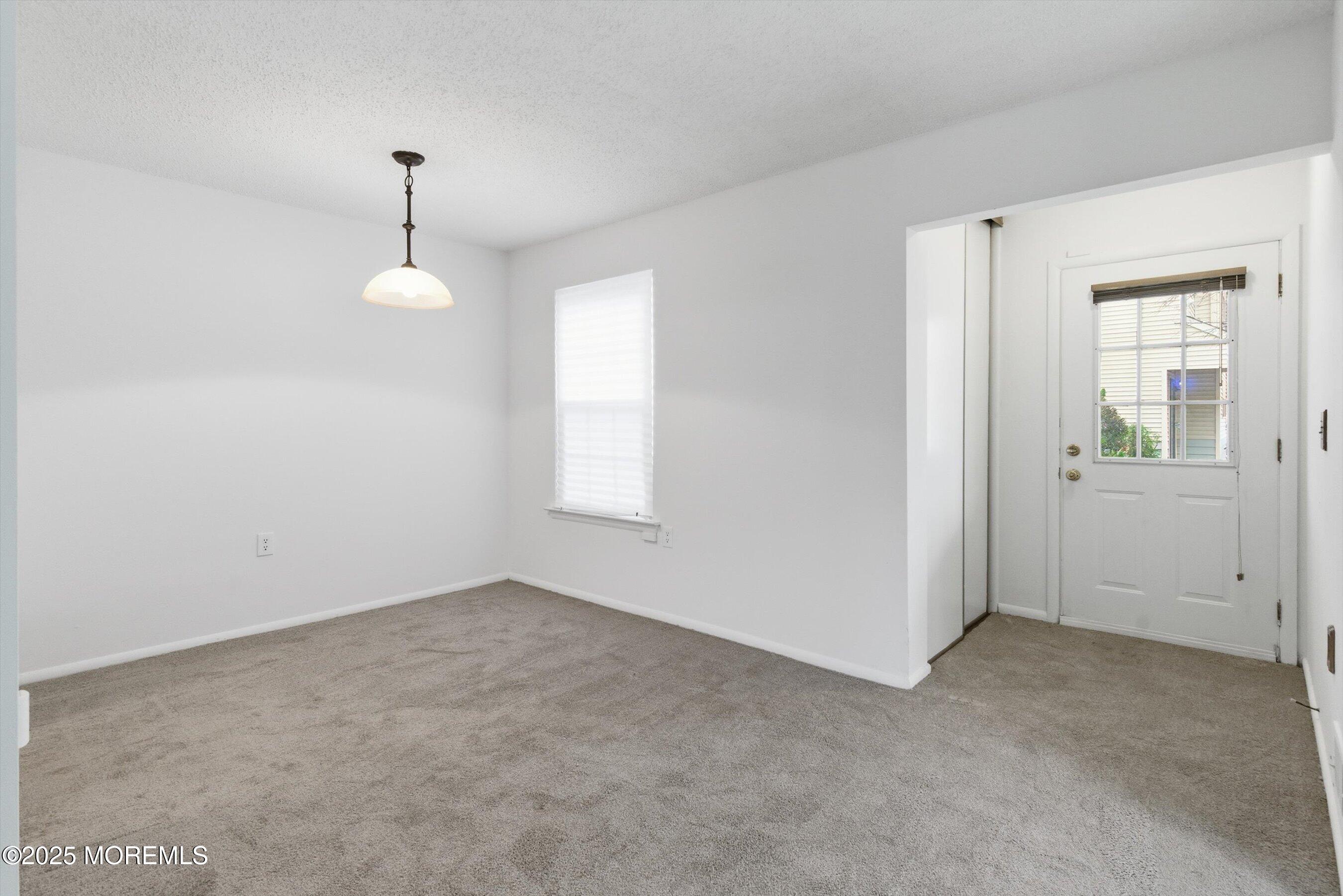 602 Violet Lane Jackson, NJ 08527 - Photo 7 of 28 07-Foyer to Dining