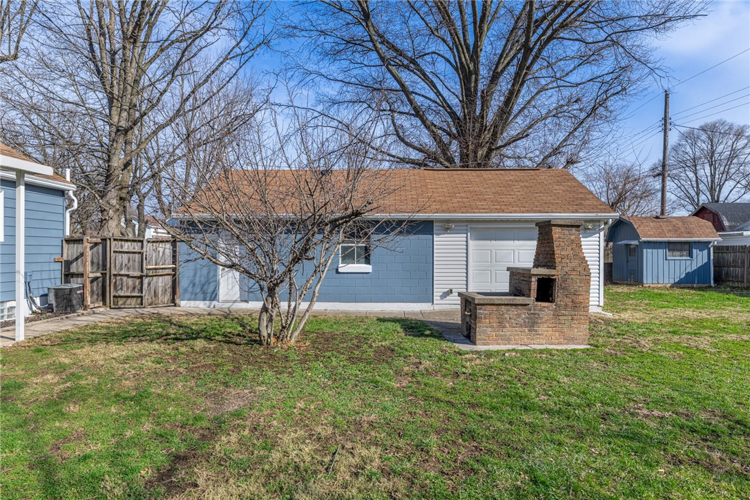 436 Marjorie Avenue Riverside, OH 45404 - Photo 28 of 34 An inviting backyard with a brick outdoor barbecue, perfect for gatherings.