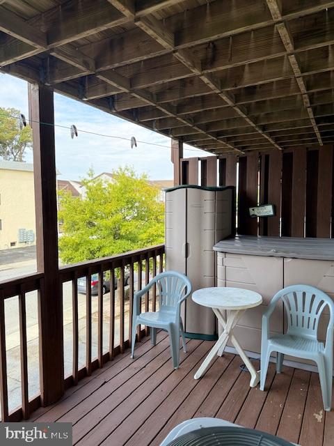 14401 Tunnel Avenue, Unit 262 Ocean City, MD 21842 - Photo 12 of 14 a view of a chairs and table in the balcony