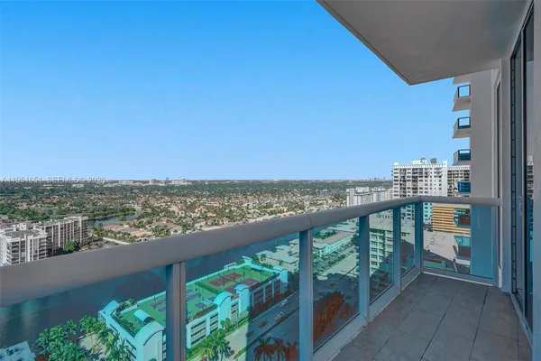 a view of a balcony with city view
