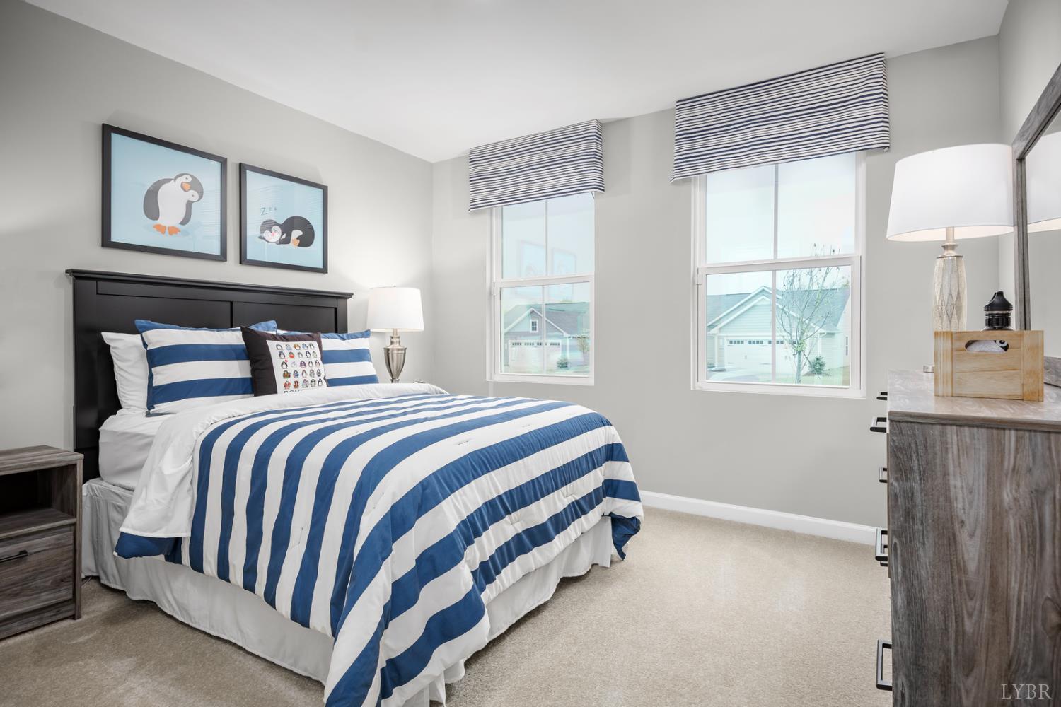 51 Crossing Court Bedford, VA 24523 - Photo 2 of 14 a bedroom with a bed and window