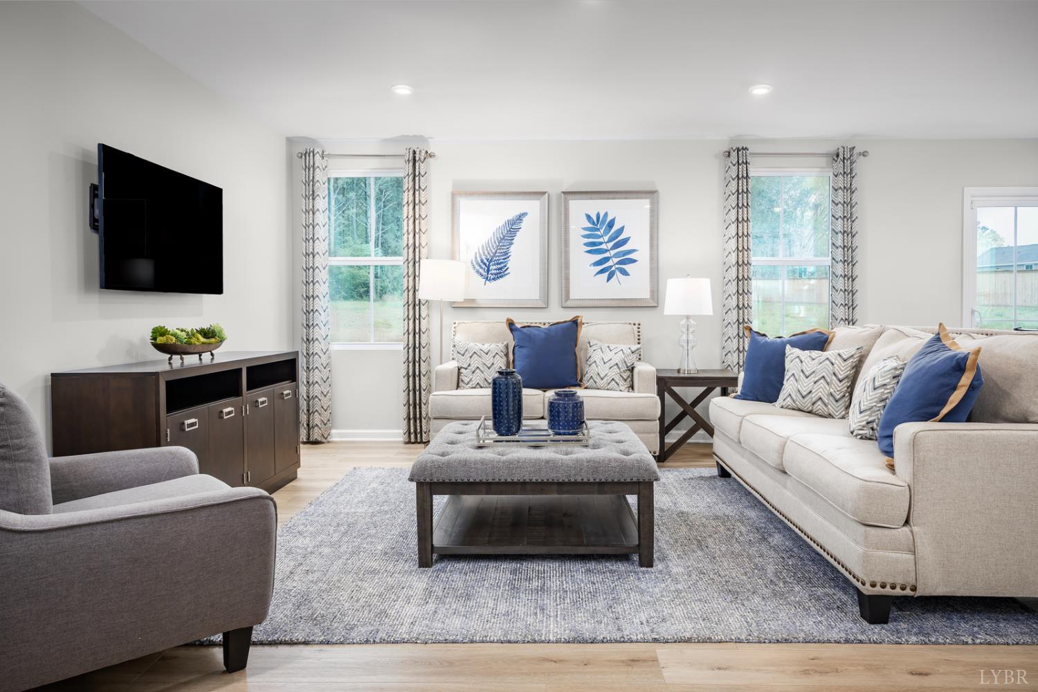 51 Crossing Court Bedford, VA 24523 - Photo 9 of 14 a living room with furniture and a flat screen tv