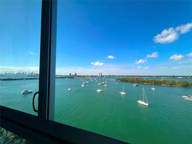 a view of a lake from a balcony