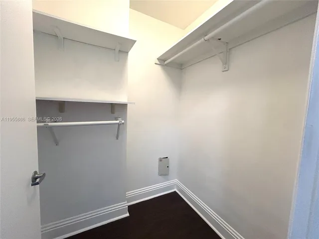 a view of a building with a park