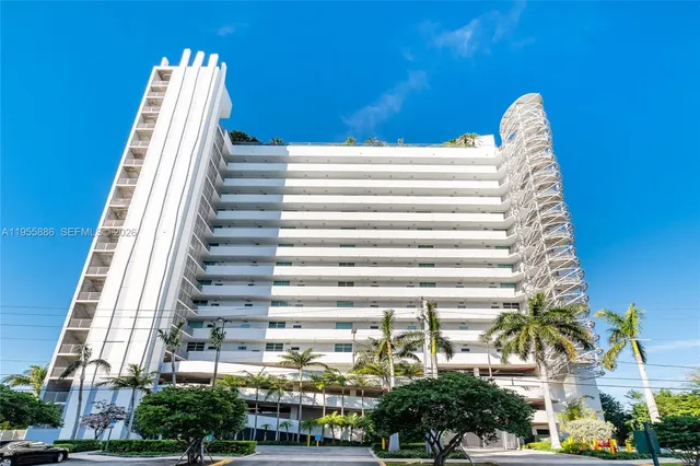 a view of a patio with swimming pool