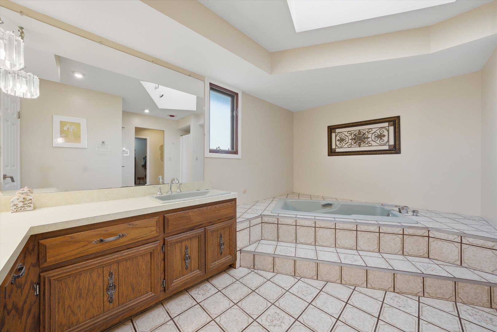 24346 South Timberline Trail Crete, IL 60417 - Photo 18 of 31 a spacious bathroom with a granite countertop sink mirror and vanity