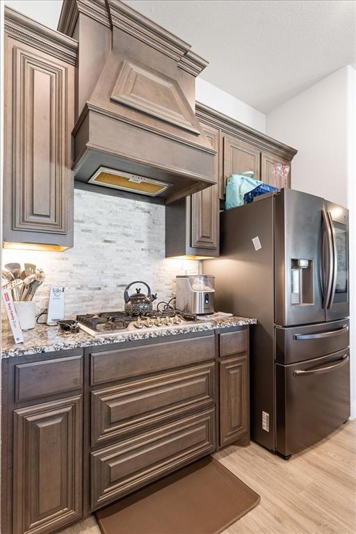 4209 Misty Ridge Street Mesquite, TX 75181 - Photo 21 of 40 a kitchen with stainless steel appliances granite countertop a sink and cabinets