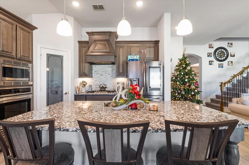 4209 Misty Ridge Street Mesquite, TX 75181 - Photo 22 of 40 a view of a dining room with furniture