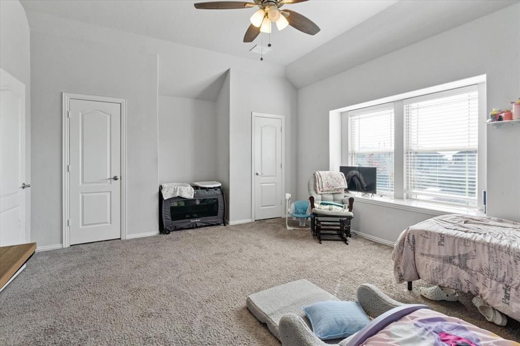 4209 Misty Ridge Street Mesquite, TX 75181 - Photo 36 of 40 a living room with furniture and a chandelier